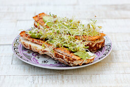 Pretzel buns with soy cutlets and sprouts