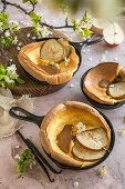 Dutch Babies with pear and chocolate sauce