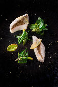 Confit St Peter's fish with seaweed and asparagus vegetables