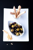 Grissini and pickled black and green olives