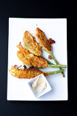 Baked squash blossoms with dip