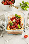 Dutch Baby with roasted balsamic strawberries and ricotta cheese