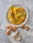 Carrot hummus with spiced oil and toasted bread