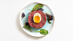 Soft-boiled egg on beef tartare