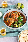 Spatchcock Chicken Curry with Curry Leaves, Lime, and Roti