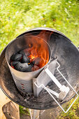 Charcoal grill with chimney starter