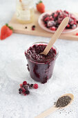 Raw jam with mixed berries, chia seeds and honey
