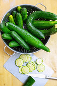 Different kinds of cucumbers in a sieve