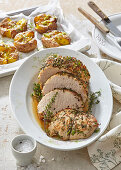 Thyme roast pork with baked potatoes