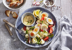 Cauliflower salad with boiled eggs and mustard sauce