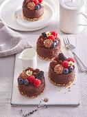 Chocolate mini cakes with berries