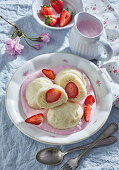 Strawberry dumplings with strawberry sauce