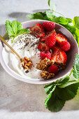 Plain yogurt with berries and walnuts