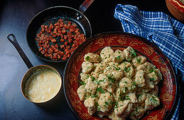 Potato and leek gnocchi with bacon and cheese sauce