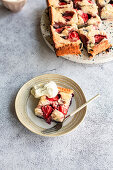Strawberry blueberry sheet cake with coconut milk and coconut flakes