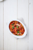 Scalloped bucatini with tomato sauce and meatballs
