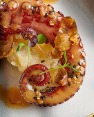 Braised octopus with brown butter and Jerusalem artichoke puree