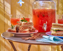 Tramezzini sandwiches and grapefruit cocktail