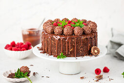 Cheesecake with raspberries and chocolate balls