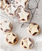 Mini vanilla mince pies with berry and cherry filling