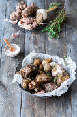 Roasted Jerusalem artichokes with garlic and thyme