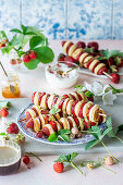 Mini pancake skewers with strawberries