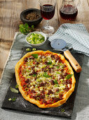 Ground meat pizza with spring onions