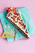 School cone cake with sweets