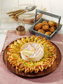 Potato puff pastry sun with baked cheese