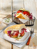 Vegetarian vegetable sandwich with red cabbage salad