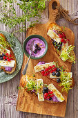 Crostini with camembert, fresh berries and walnuts