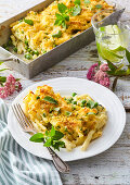 Baked pasta with peas and spinach