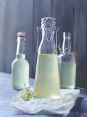 Bottles of elderflower syrup