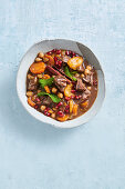 Lamb stew with apricots cooked in the slow cooker
