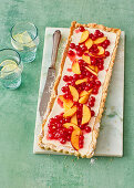 Yogurt panna cotta tart with berries and nectarines