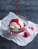 Vanilla ice cream with raspberry sauce