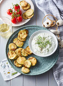 Courgette crisps with tzatziki