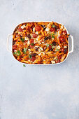 Greek pasta bake with tomatoes, peppers and feta