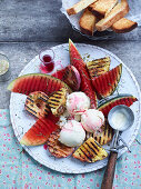 Grilled fruit with ice-cream scoops and brioche