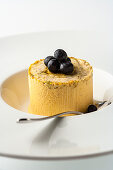 Peach semifreddo with candied pistachios and blueberries