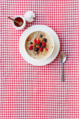 Porridge with berries and honey