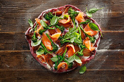 Beetroot pizza with leek, broccolini and baby spinach
