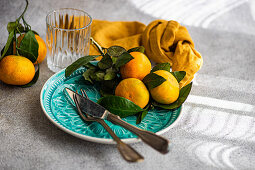 Place setting with tangerines