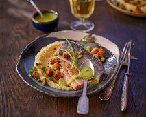 Trout fillet with chartreuse sauce on polenta