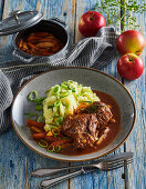 Pork cheeks braised in cider with mashed potatoes