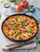 Sweet apple and potato pie with sultanas