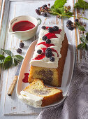 Sweet poppy seed cake with blackberries