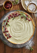 White chocolate tart with rosemary and cranberries