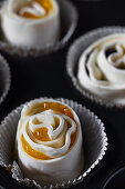 Puff pastry buns with jam before baking