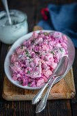 Herring salad with beetroot, potatoes and horseradish sauce